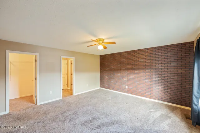 a view of livingroom with kitchen