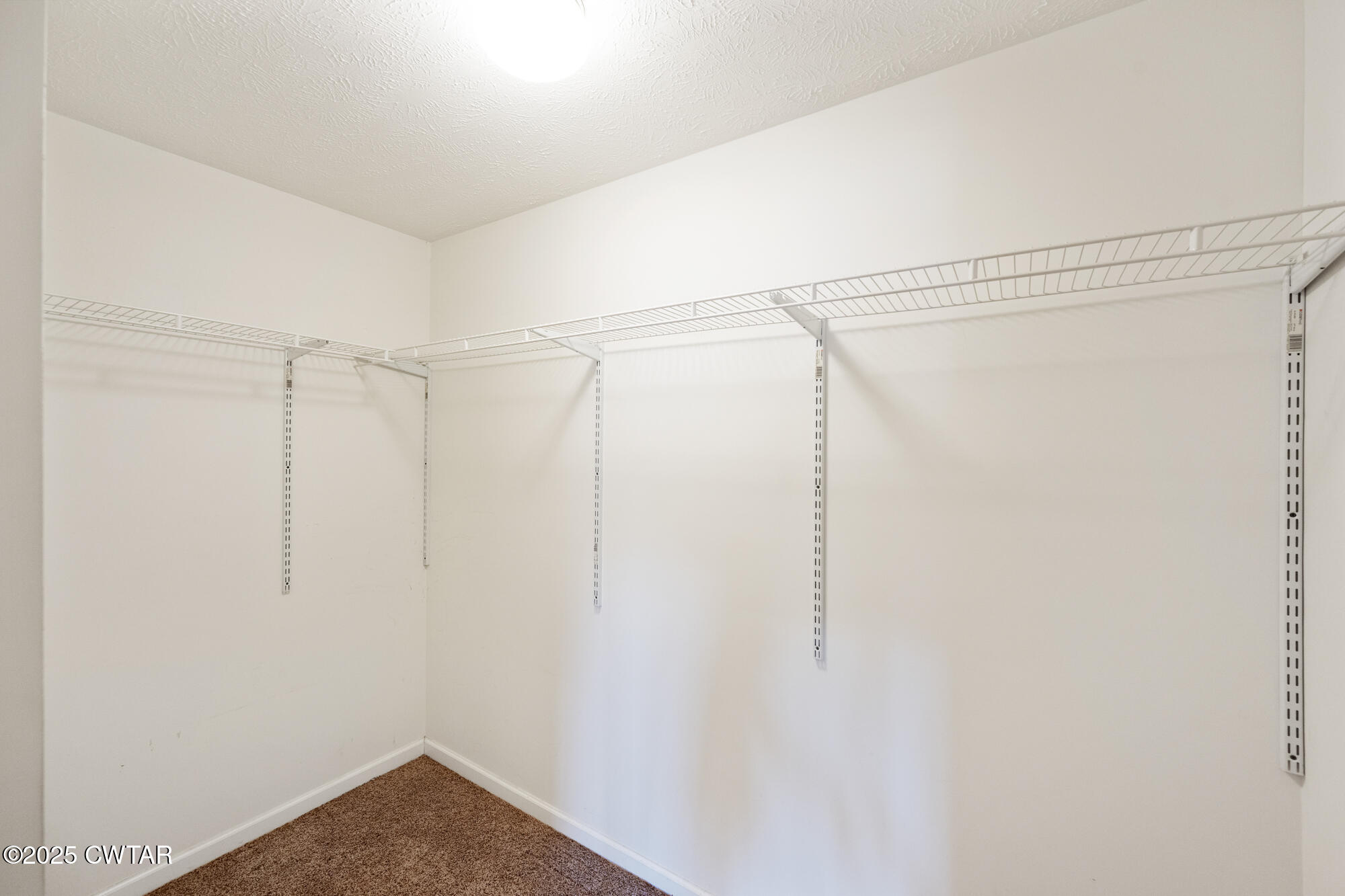 750 Northwind Loop Lexington, TN 38351 - Photo 16 of 33 a view of an empty walk in closet