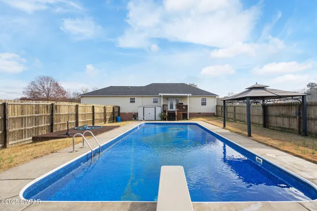 a view of a house with pool