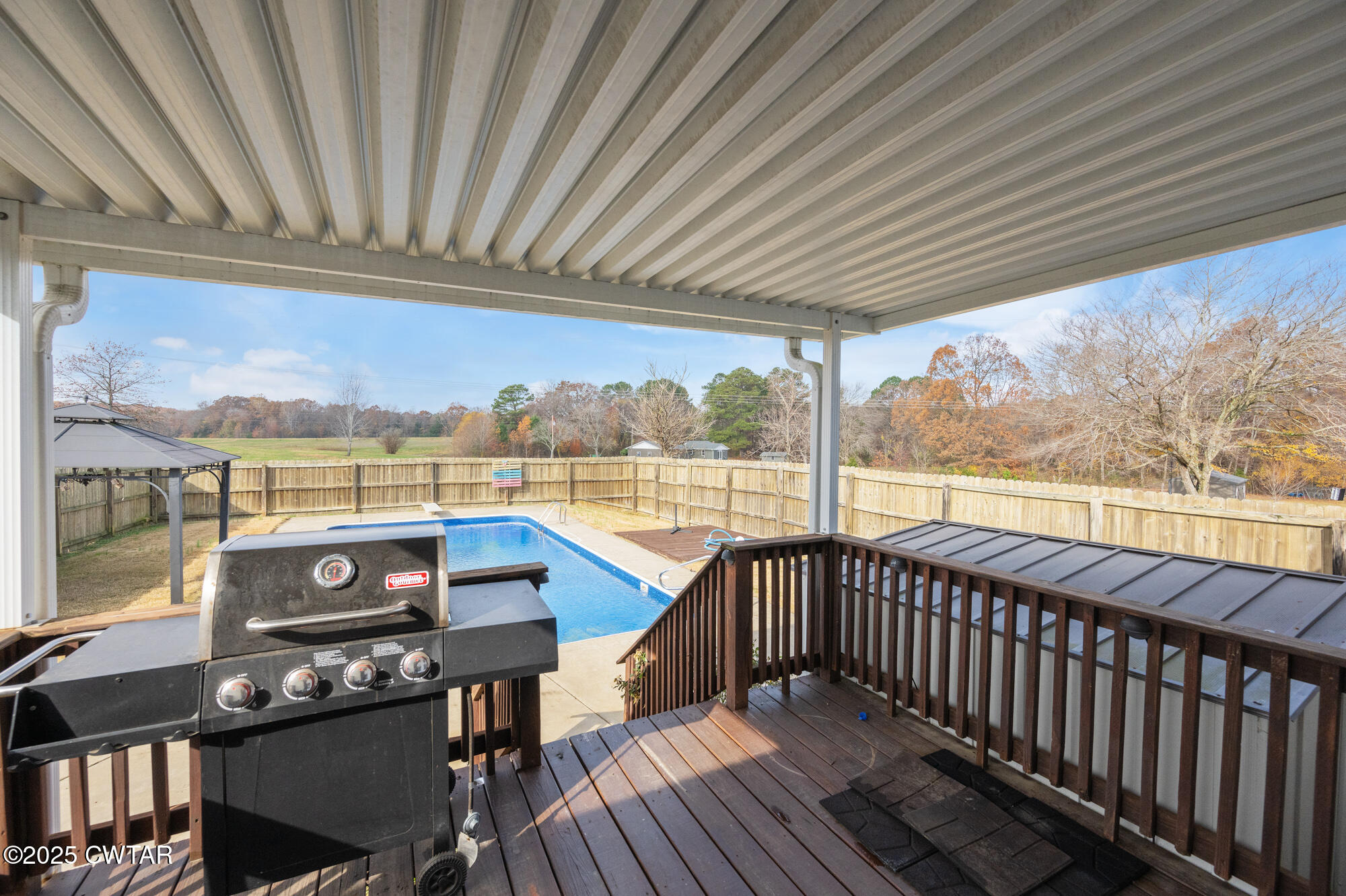 750 Northwind Loop Lexington, TN 38351 - Photo 21 of 33 a view of a balcony with furniture and wooden floor