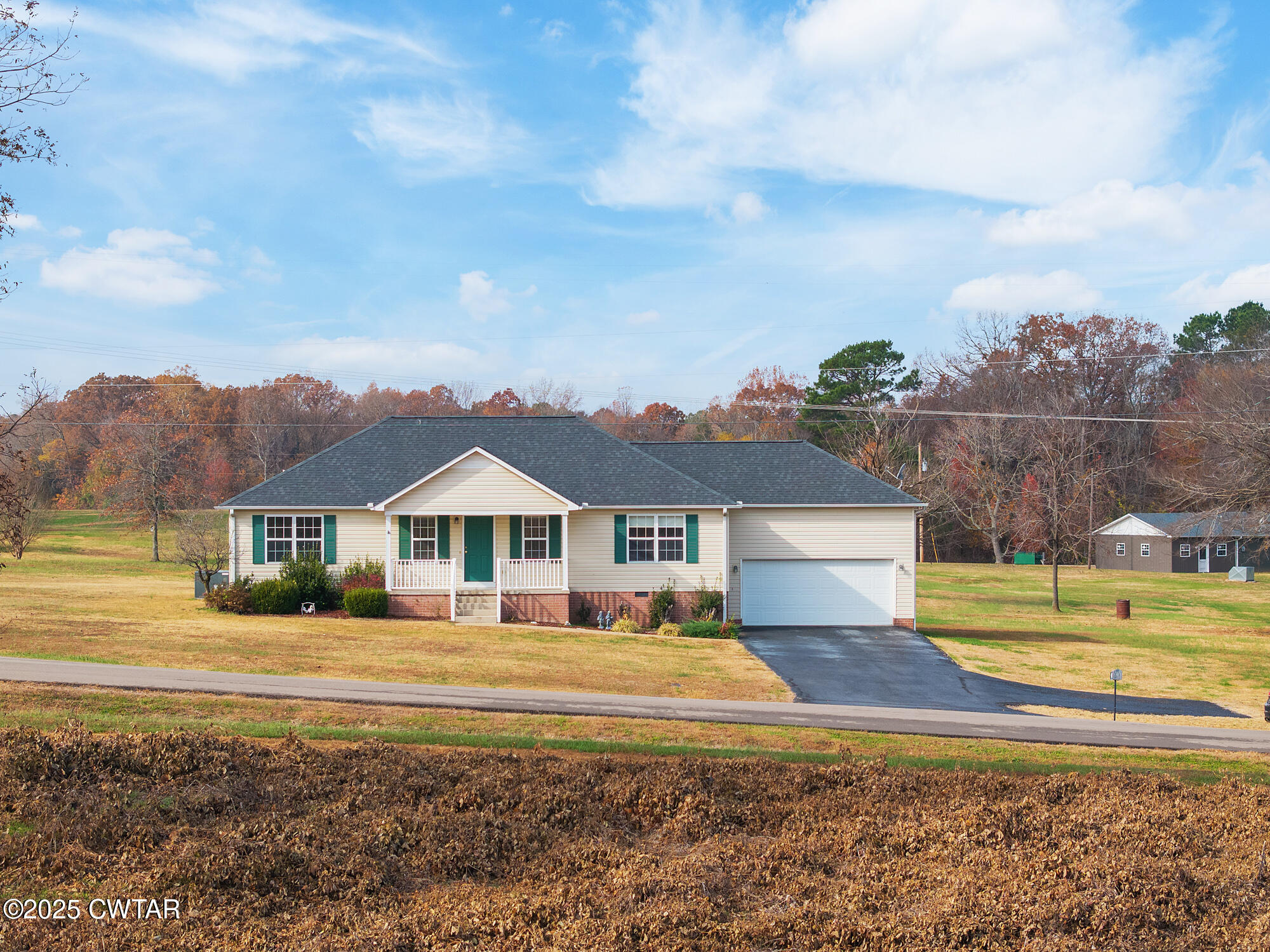 750 Northwind Loop Lexington, TN 38351 - Photo 29 of 33 a front view of a house with a big yard