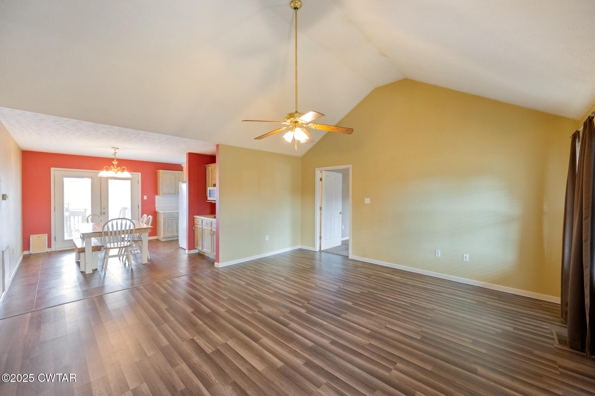 750 Northwind Loop Lexington, TN 38351 - Photo 5 of 33 a view of a room with wooden floor and a window