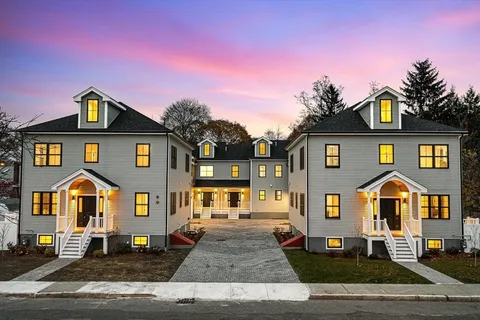 a front view of a house with street