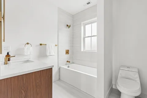 a view of a livingroom with storage and utility