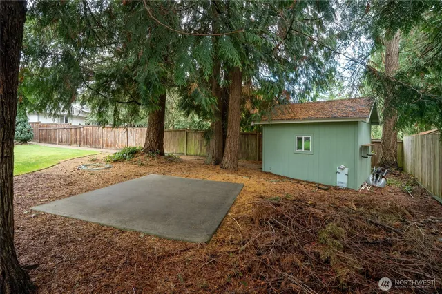 a view of a swimming pool with a yard