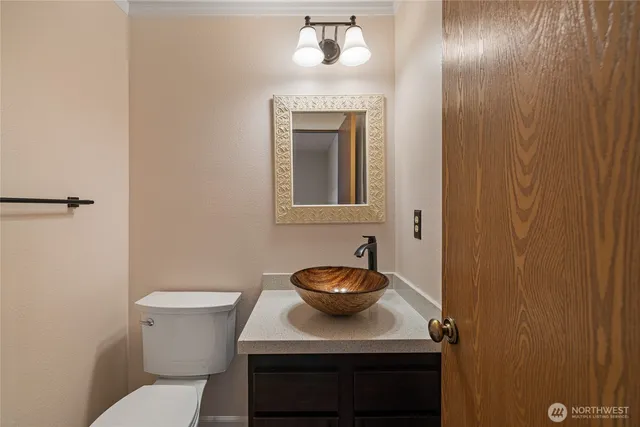 a bathroom with a sink and a toilet