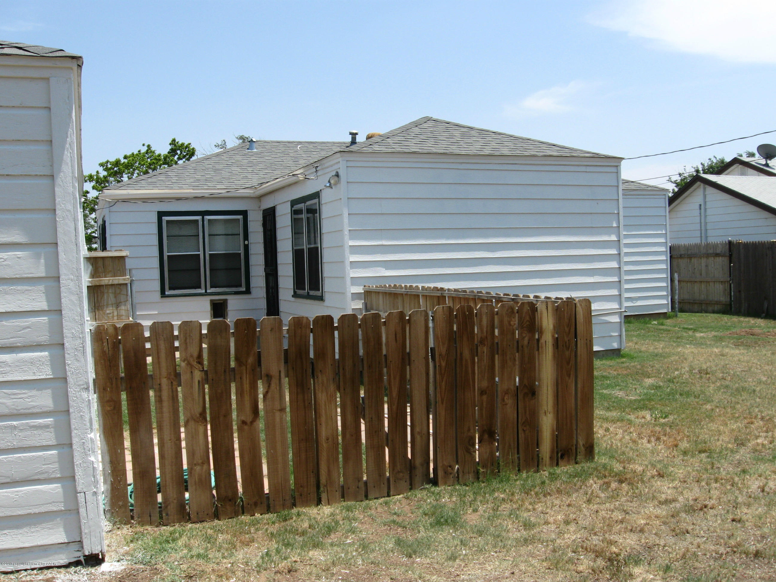 4410 South Lipscomb Street Amarillo, TX 79110 - Photo 11 of 19 a front view of house with a garden