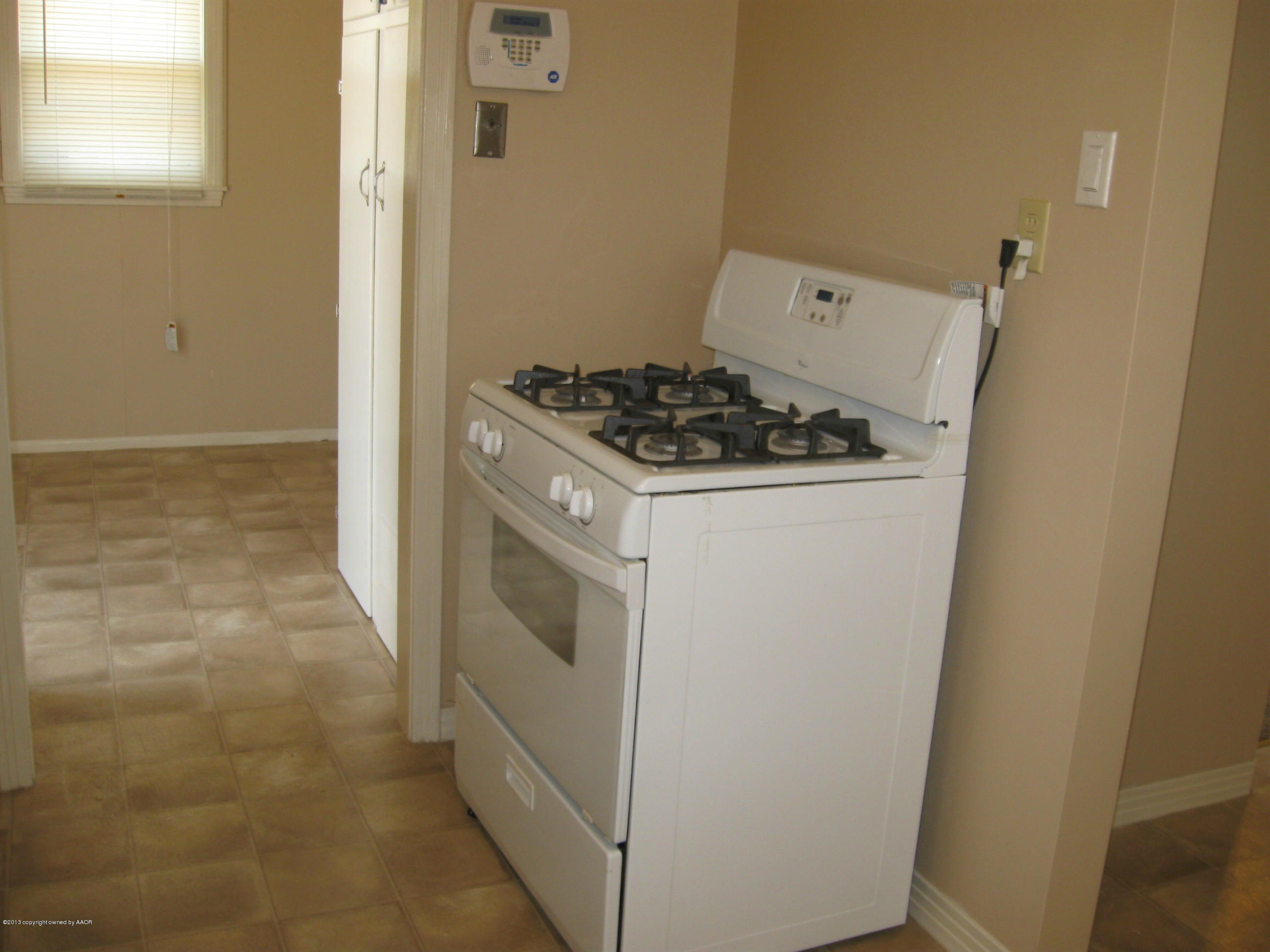 4410 South Lipscomb Street Amarillo, TX 79110 - Photo 15 of 19 a view of a storage and utility room with washer and dryer