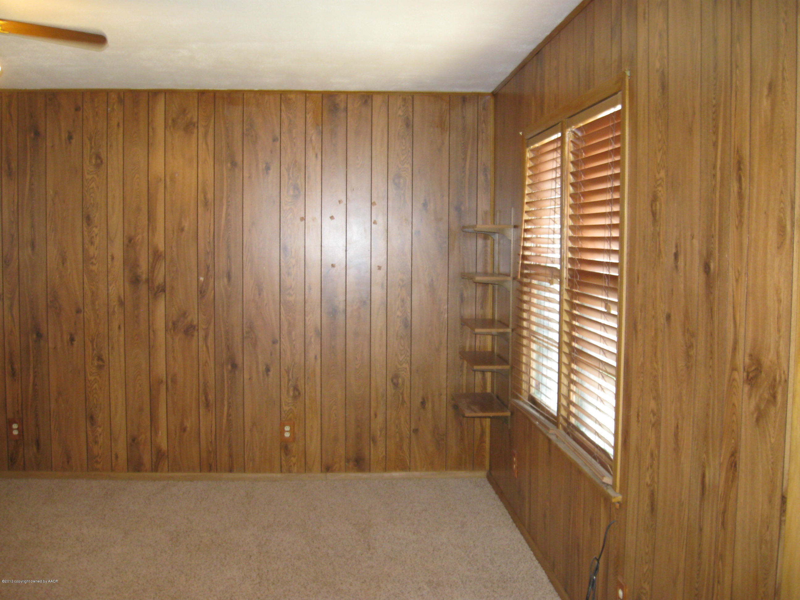4410 South Lipscomb Street Amarillo, TX 79110 - Photo 18 of 19 a view of a hallway with windows