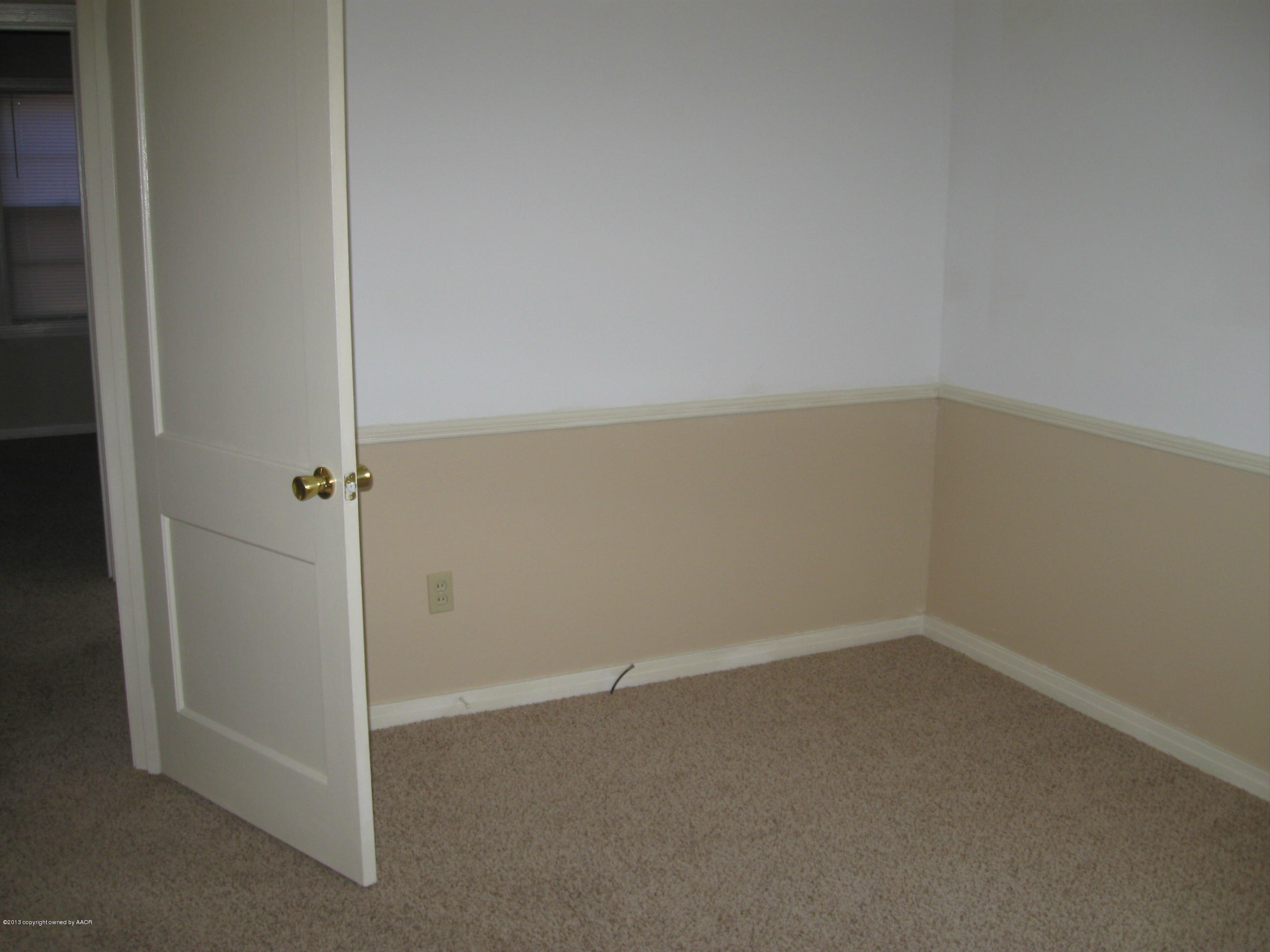 4410 South Lipscomb Street Amarillo, TX 79110 - Photo 6 of 19 wooden floor in an empty room