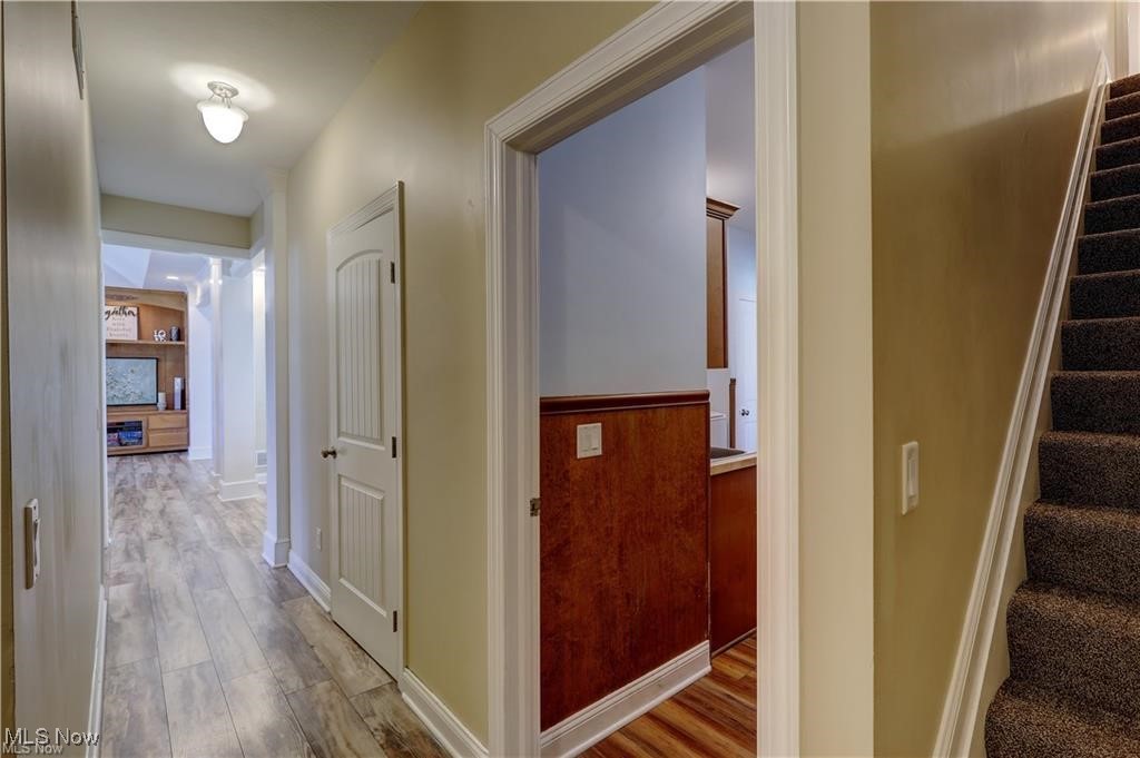 3079 Alexander Road Atwater, OH 44201 - Photo 18 of 45 Corridor featuring wood finished floors