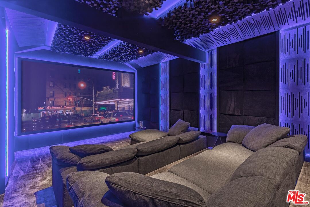 3904 Valley Meadow Road Encino, CA 91436 - Photo 15 of 27 a living room with furniture and a glass door