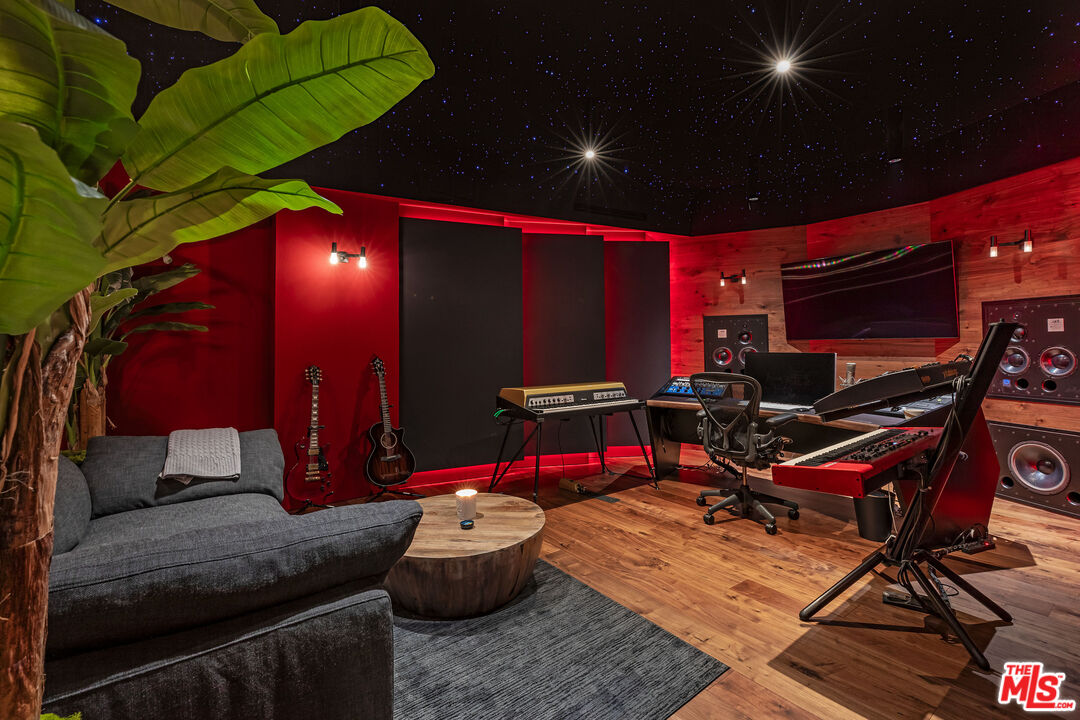 3904 Valley Meadow Road Encino, CA 91436 - Photo 21 of 27 a view of gym equipment with gaming equipment