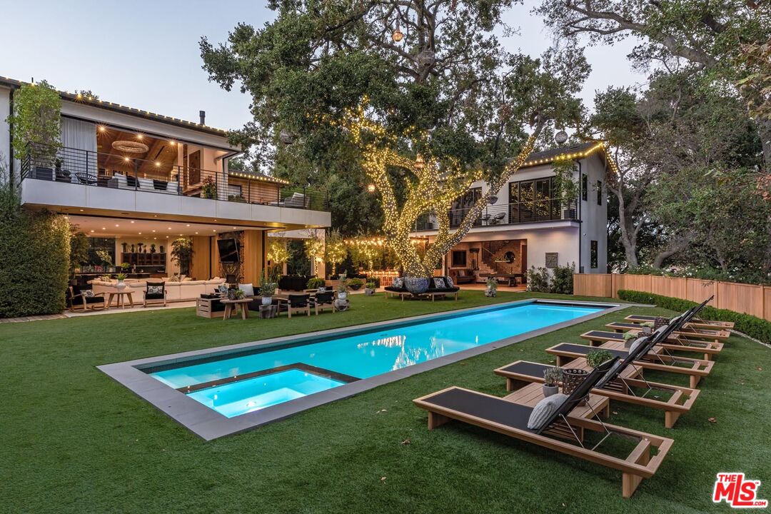 3904 Valley Meadow Road Encino, CA 91436 - Photo 23 of 27 a front view of house with yard and outdoor seating