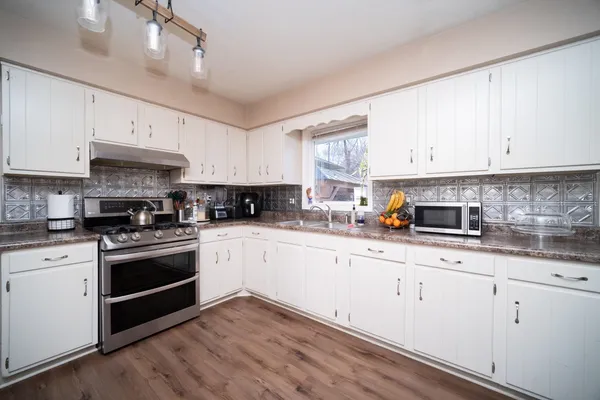 a bedroom with a bed and tv