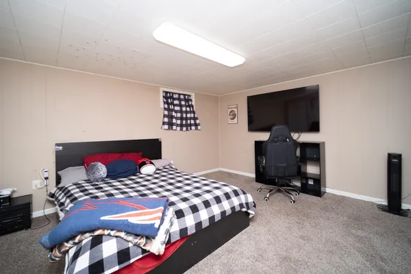 a view of a porch with wooden fence