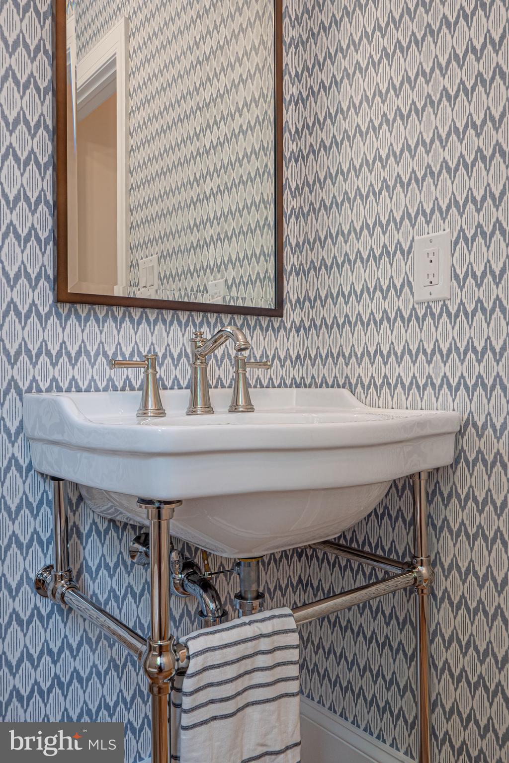 5 Timber Mill Lane, Unit BISCOTTO Landenberg, PA 19350 - Photo 15 of 70 a bathroom with a sink and a mirror