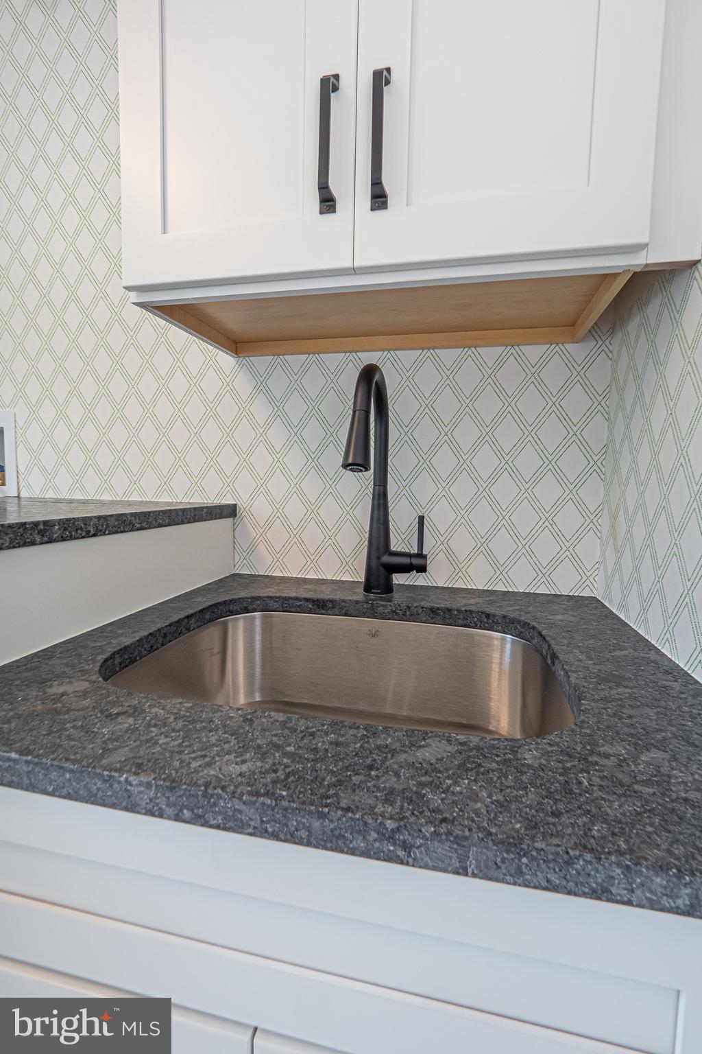 5 Timber Mill Lane, Unit BISCOTTO Landenberg, PA 19350 - Photo 46 of 70 a kitchen sink with granite countertop a sink