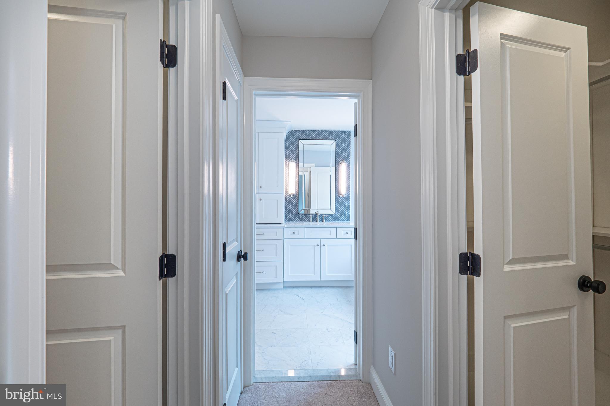 5 Timber Mill Lane, Unit BISCOTTO Landenberg, PA 19350 - Photo 50 of 70 a view of a bathroom from a hallway