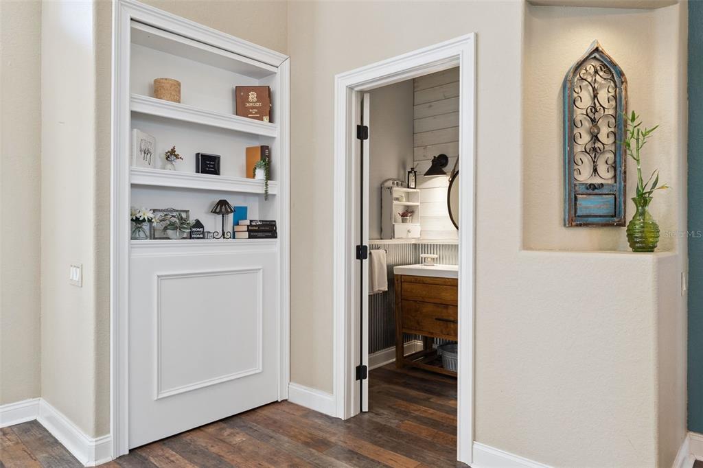 12736 Lake Ridge Circle Clermont, FL 34711 - Photo 16 of 56 a view of walk in closet with clothes and shoes