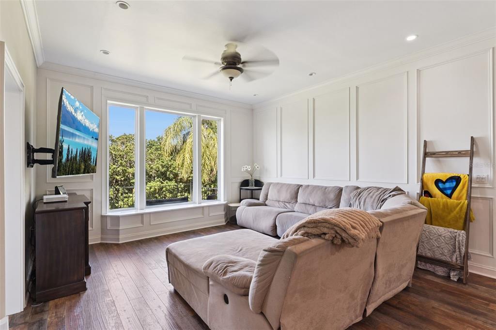 12736 Lake Ridge Circle Clermont, FL 34711 - Photo 21 of 56 a living room with furniture and a large window