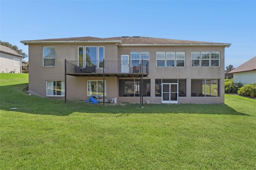 12736 Lake Ridge Circle Clermont, FL 34711 - Photo 3 of 56 a view of a yard in front of a house