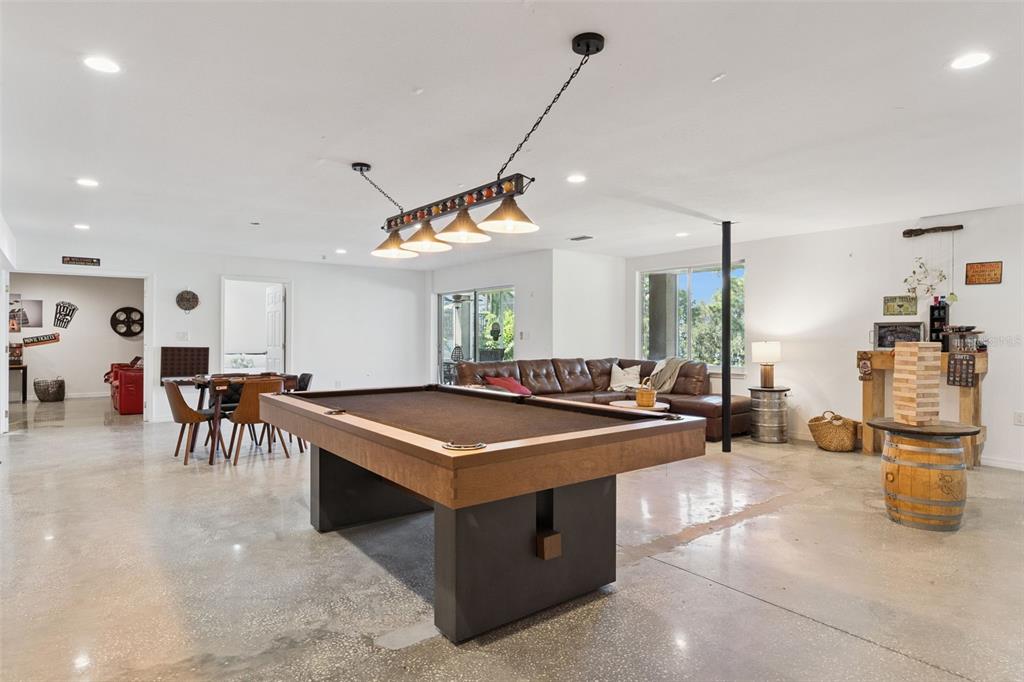 12736 Lake Ridge Circle Clermont, FL 34711 - Photo 38 of 56 a view of a room with gym equipment