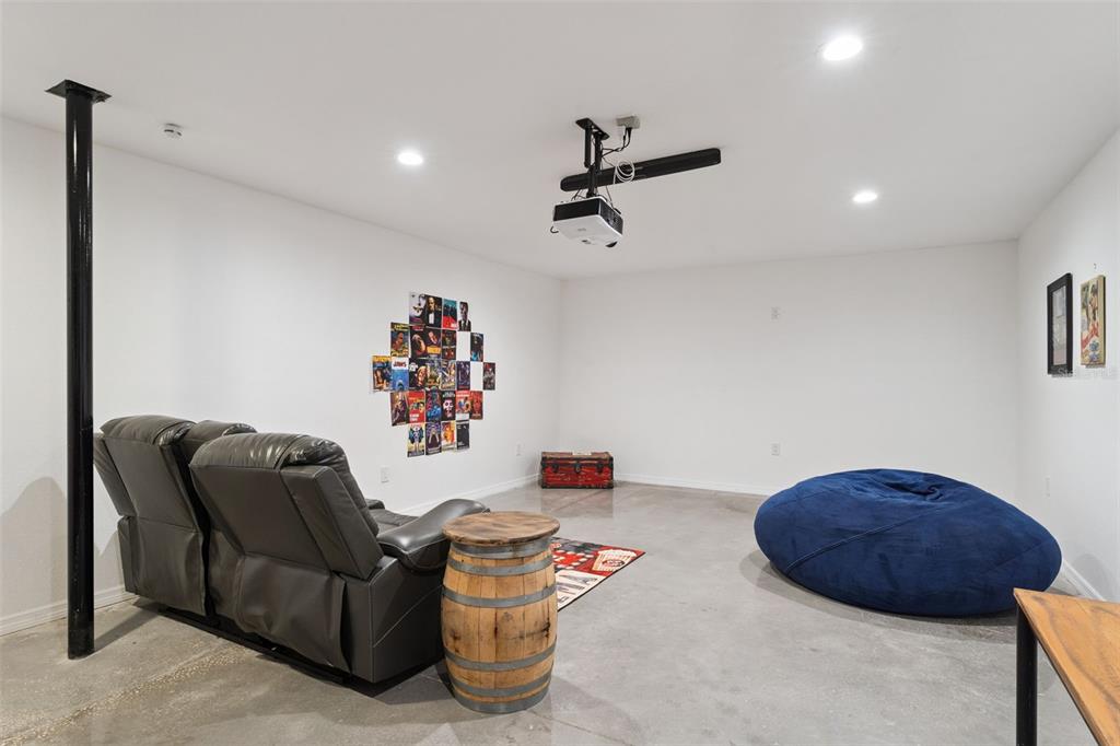 12736 Lake Ridge Circle Clermont, FL 34711 - Photo 44 of 56 a room with furniture and a couch