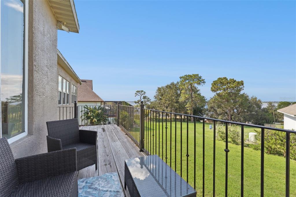 12736 Lake Ridge Circle Clermont, FL 34711 - Photo 53 of 56 a view of balcony with furniture