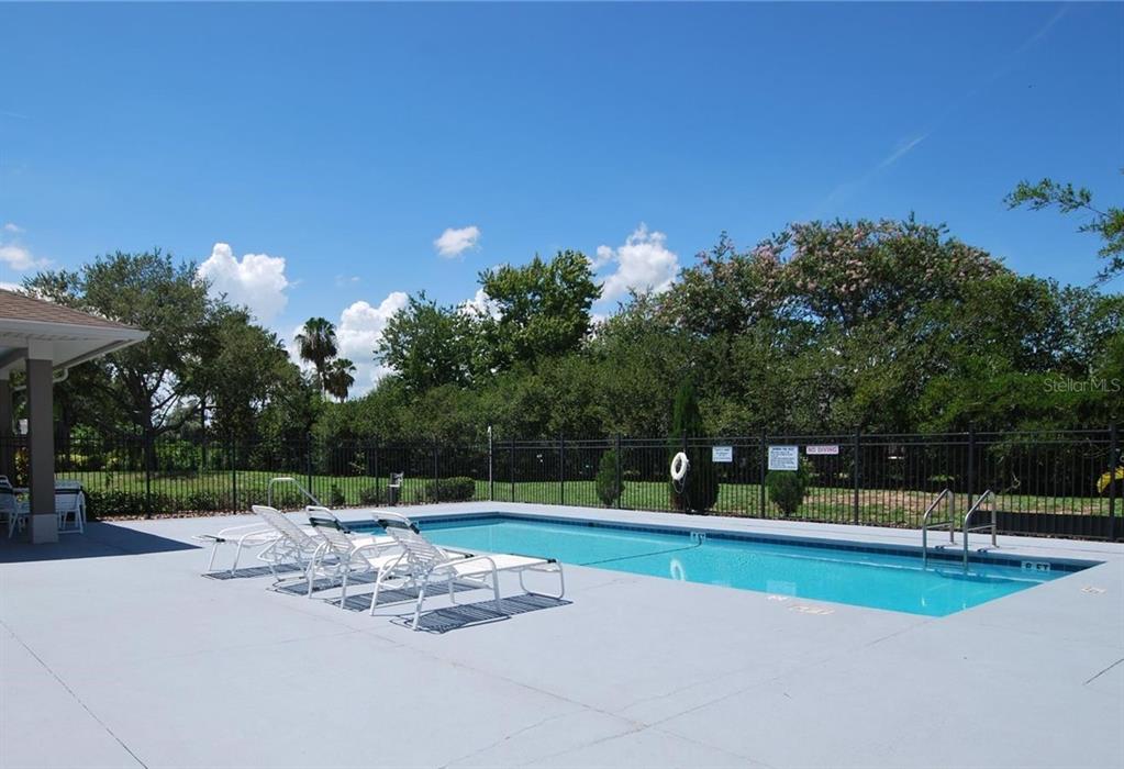 12736 Lake Ridge Circle Clermont, FL 34711 - Photo 55 of 56 a view of a park with large trees