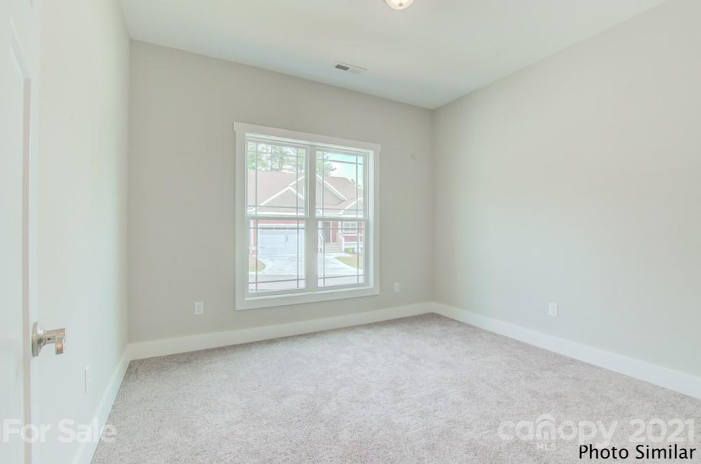 175 Hayes Rdg Lane, Unit 8 Mills River, NC 28759 - Photo 15 of 18 an empty room with a window
