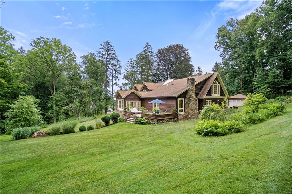 1536 Indian Springs Road Indiana, PA 15701 - Photo 3 of 43 aerial view of a house with a big yard potted plants and large tree