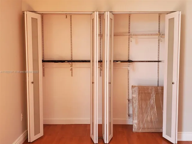 a view of a bathtub in front of window