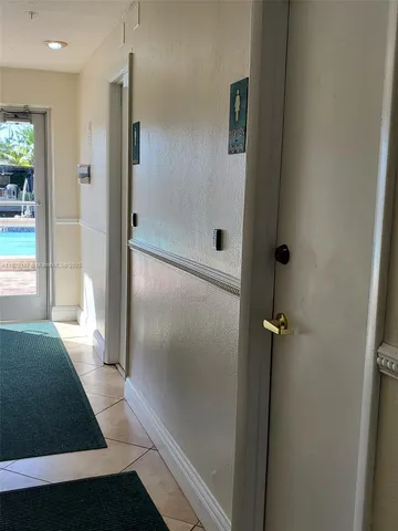 a view of a tall white building