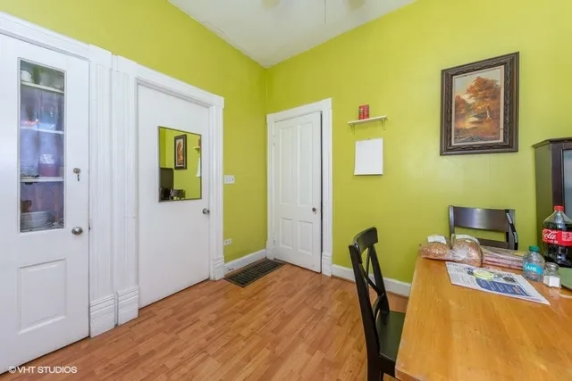 a bedroom with a bed and a desk