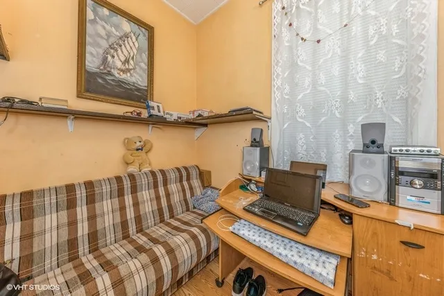 a bedroom with a bed and furniture