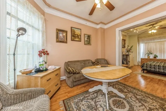a living room with furniture and a table
