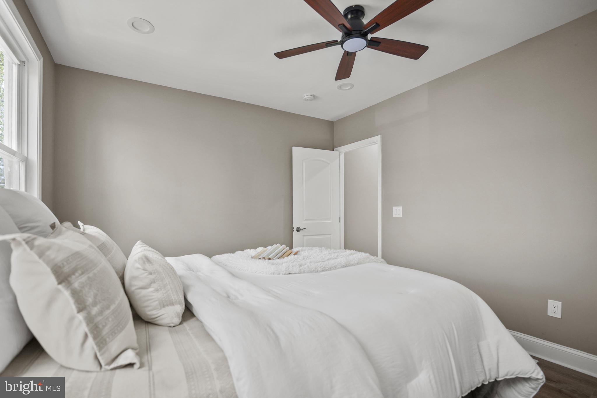 1714 East 28th Street Baltimore, MD 21218 - Photo 15 of 27 Serene bedroom with natural light.