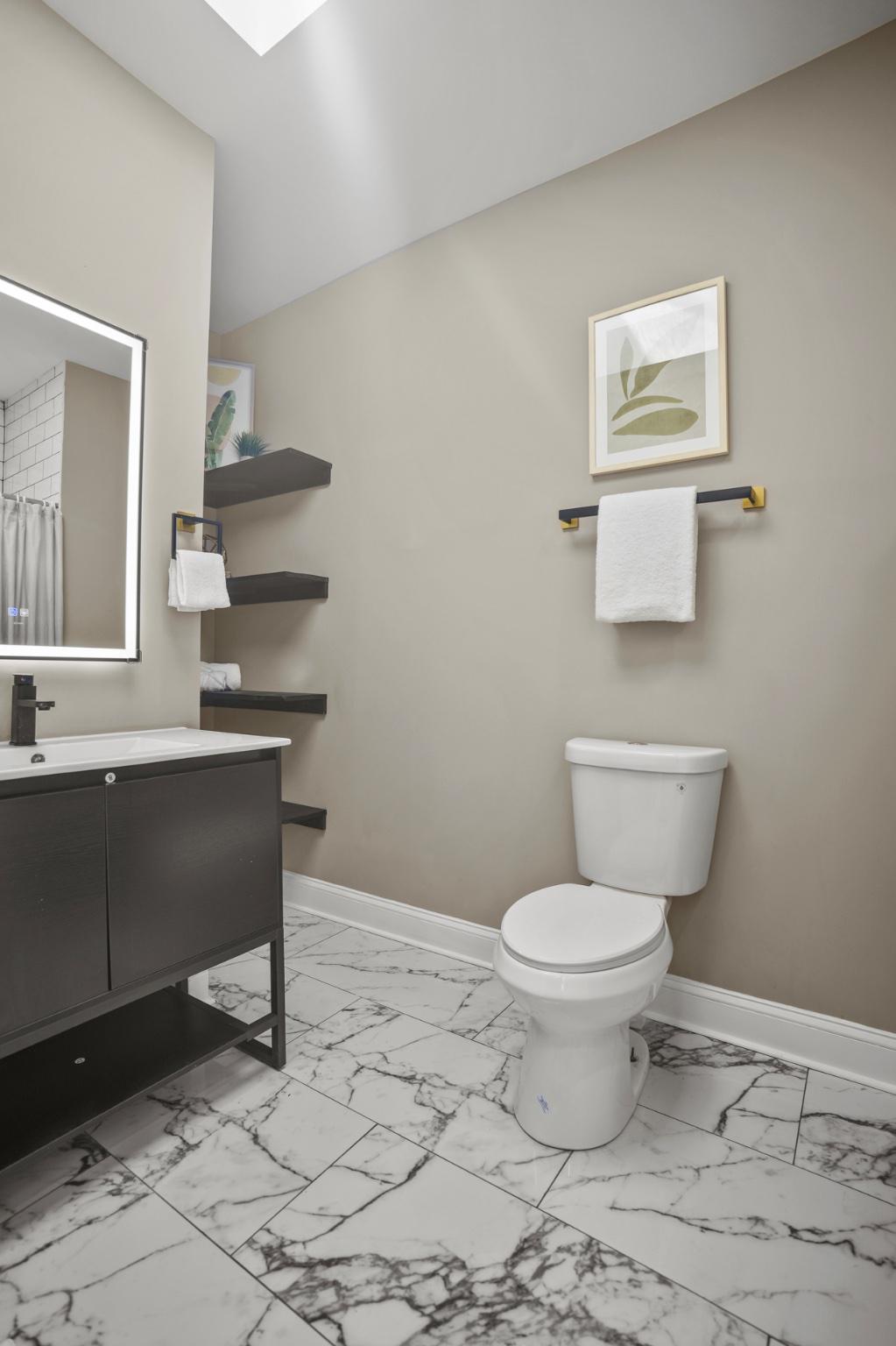 1714 East 28th Street Baltimore, MD 21218 - Photo 16 of 27 Full bath with tons of natural light