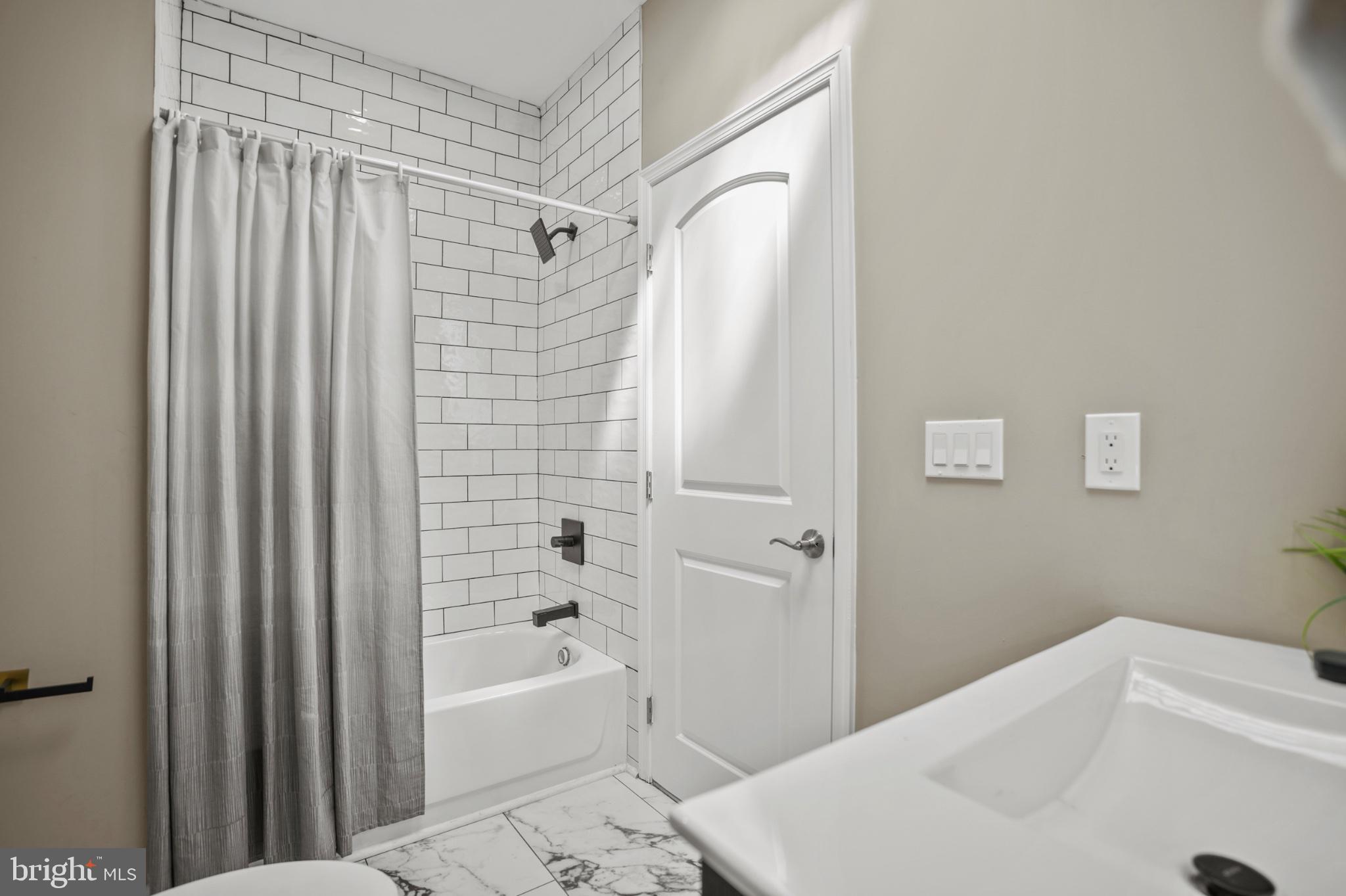 1714 East 28th Street Baltimore, MD 21218 - Photo 18 of 27 Modern bathroom with sleek finishes.