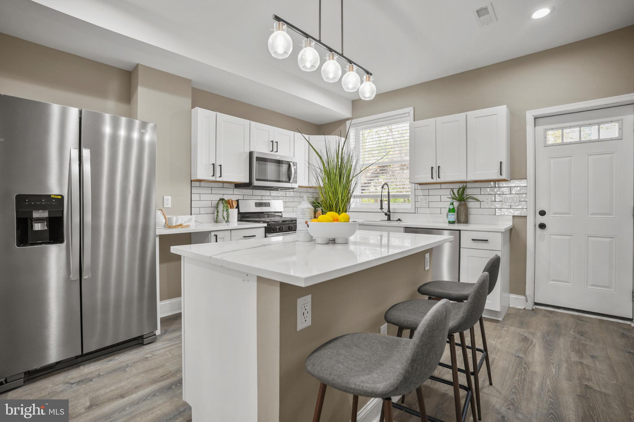 1714 East 28th Street Baltimore, MD 21218 - Photo 8 of 27 Modern kitchen with sleek design.