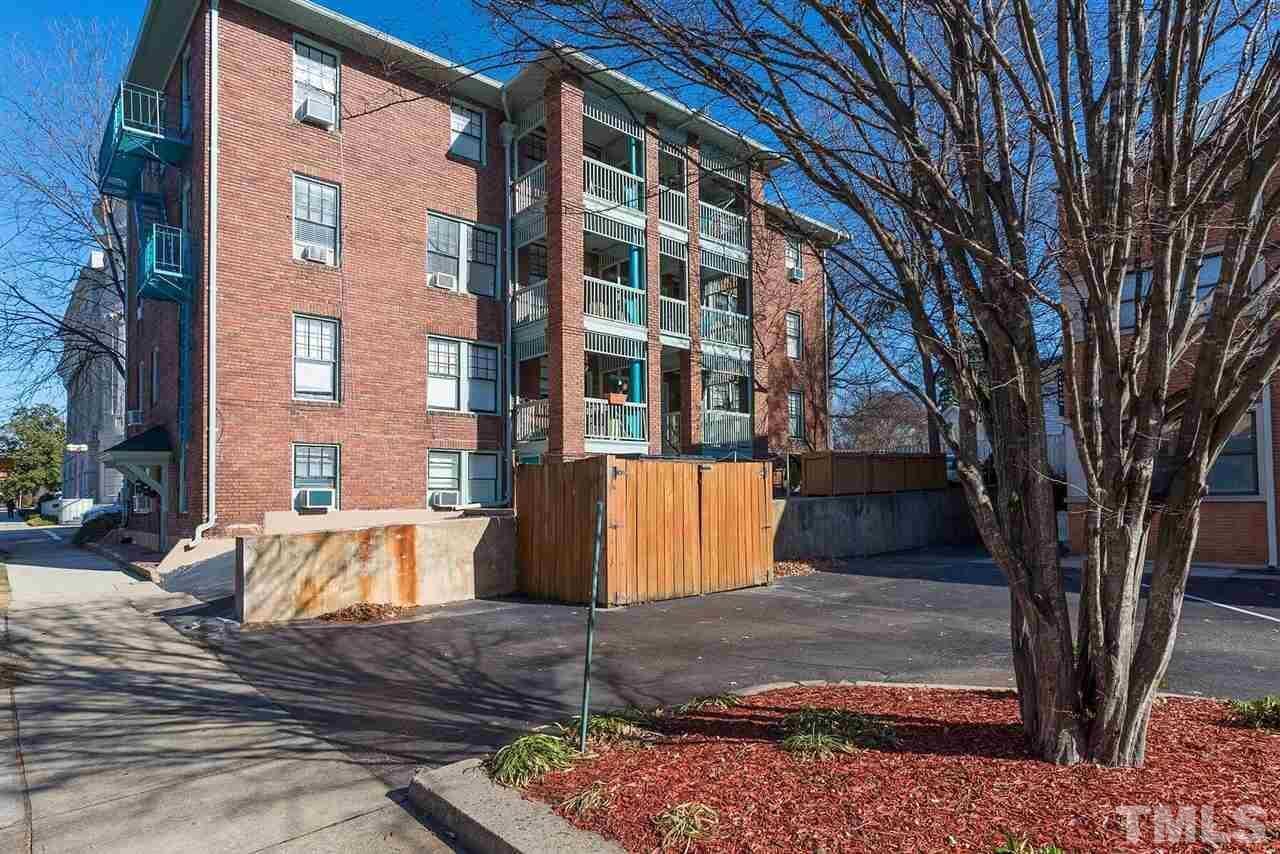 200 East Edenton Street, Unit 4 Raleigh, NC 27601 - Photo 2 of 17 a view of a building with a yard