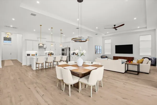a view of a dining room with furniture