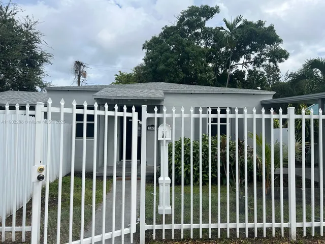 a view of a wooden fence