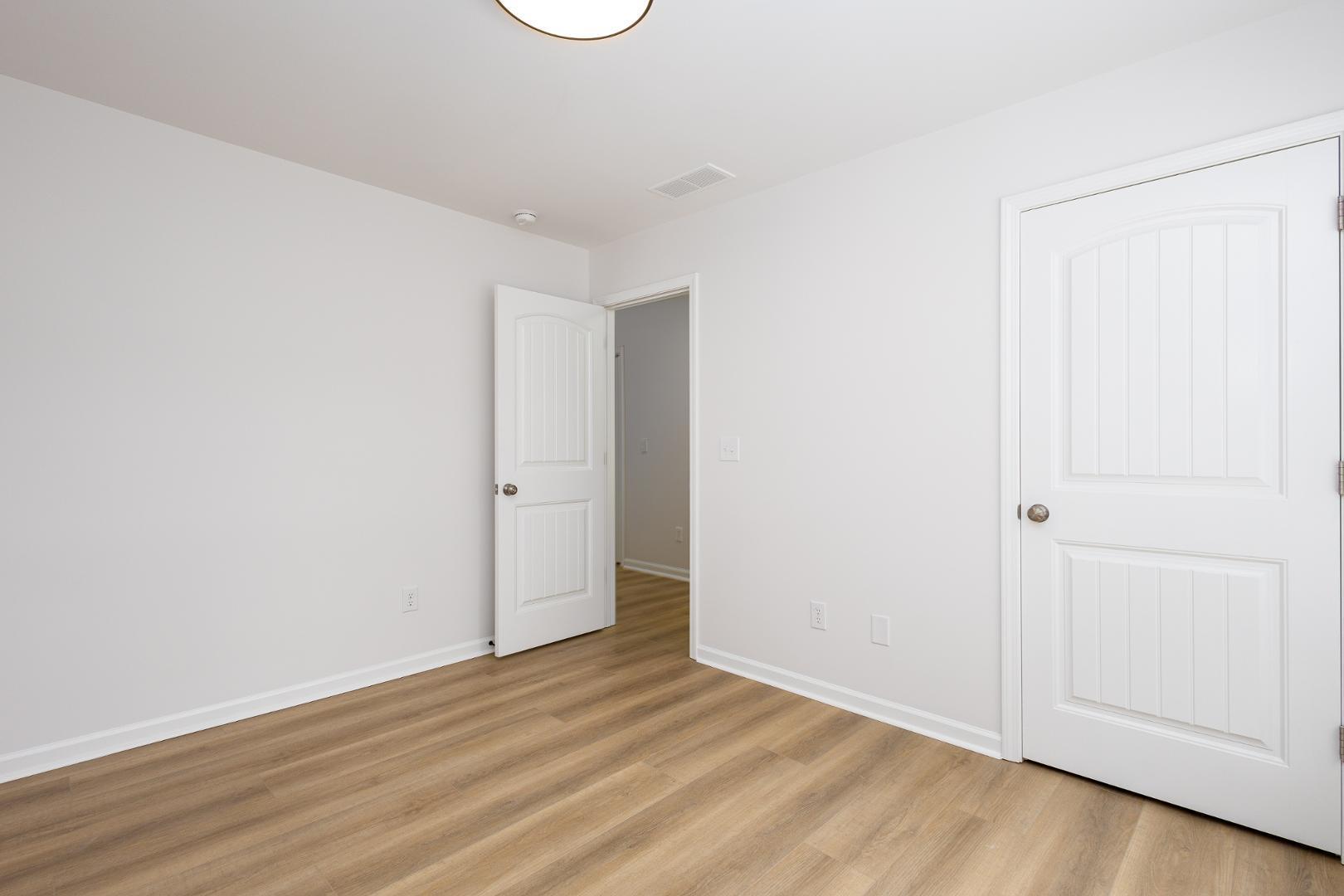 228 Skyros Loop Cary, NC 27519 - Photo 14 of 29 a view of an empty room