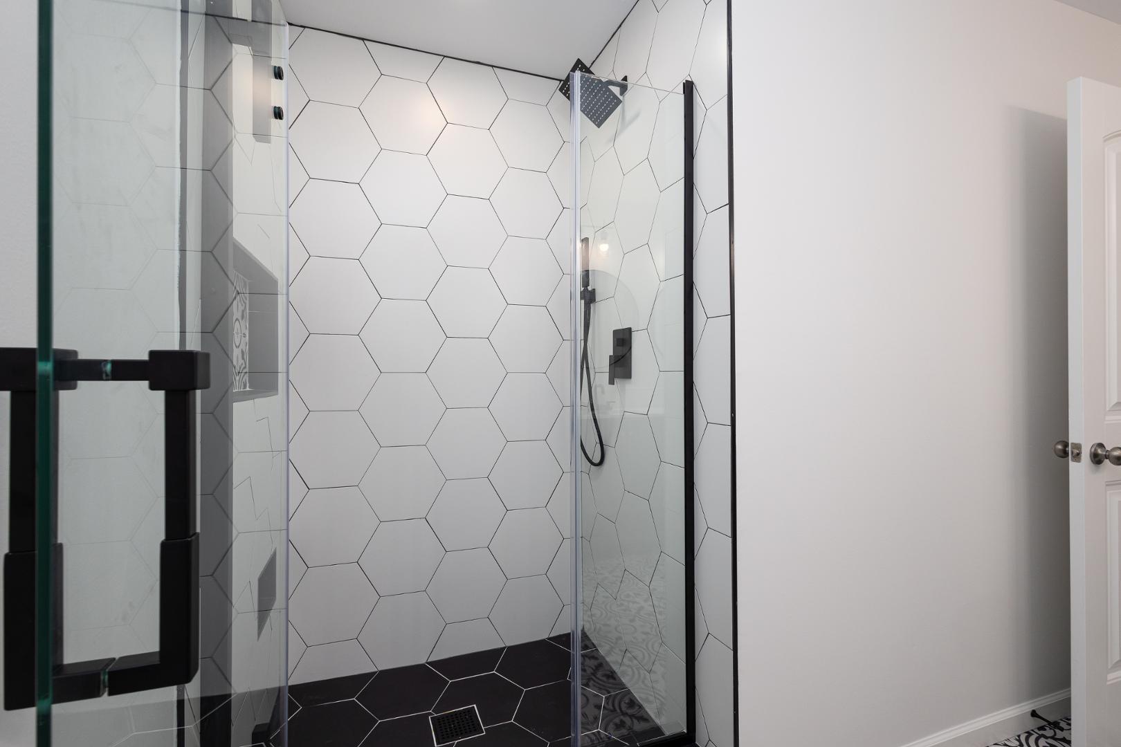 228 Skyros Loop Cary, NC 27519 - Photo 21 of 29 a bathroom with a shower