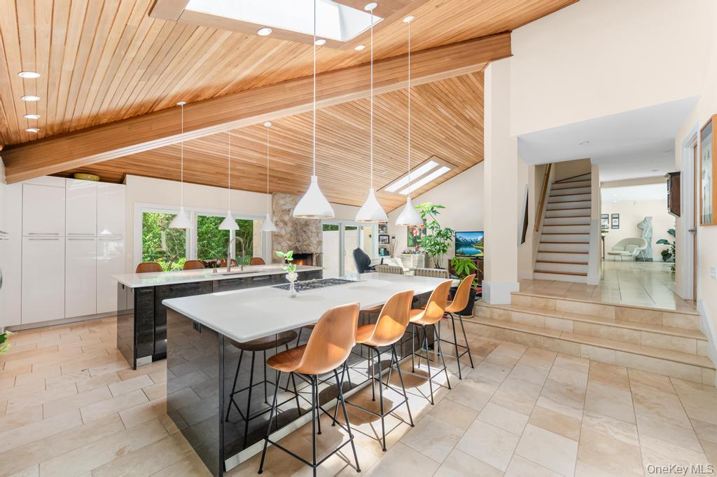 2222 Noyack Road Sag Harbor, NY 11963 - Photo 13 of 47 a outdoor dining space with furniture and outdoor view