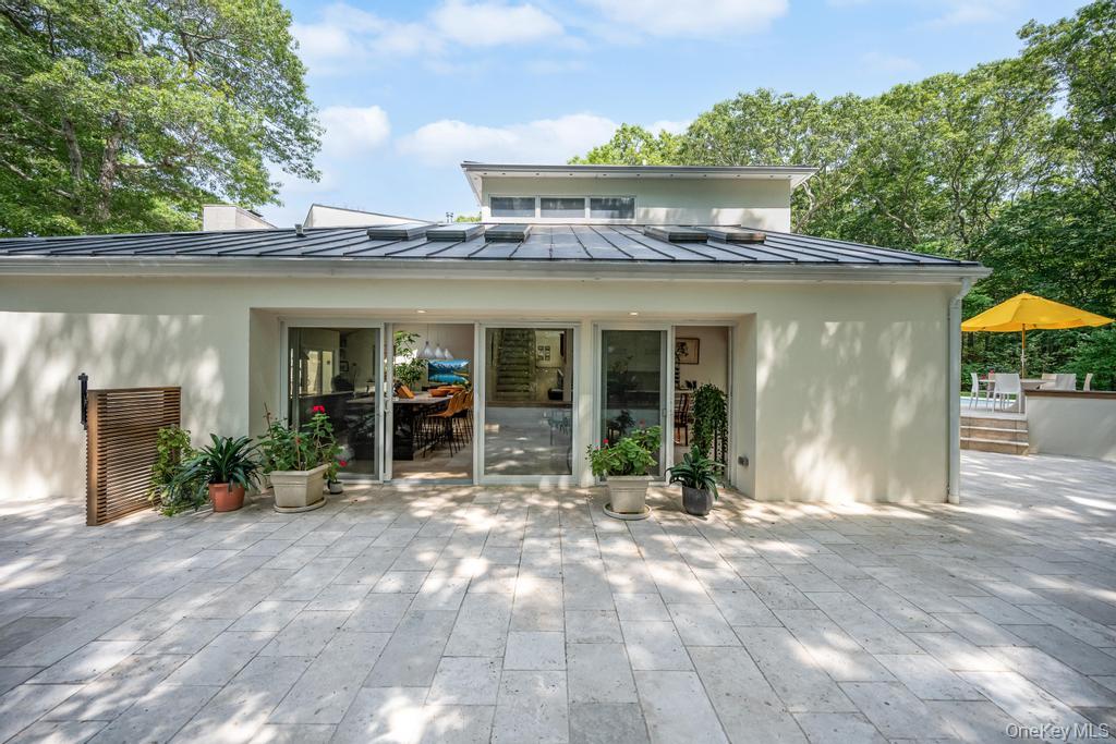 2222 Noyack Road Sag Harbor, NY 11963 - Photo 15 of 47 a view of a house with a outdoor space