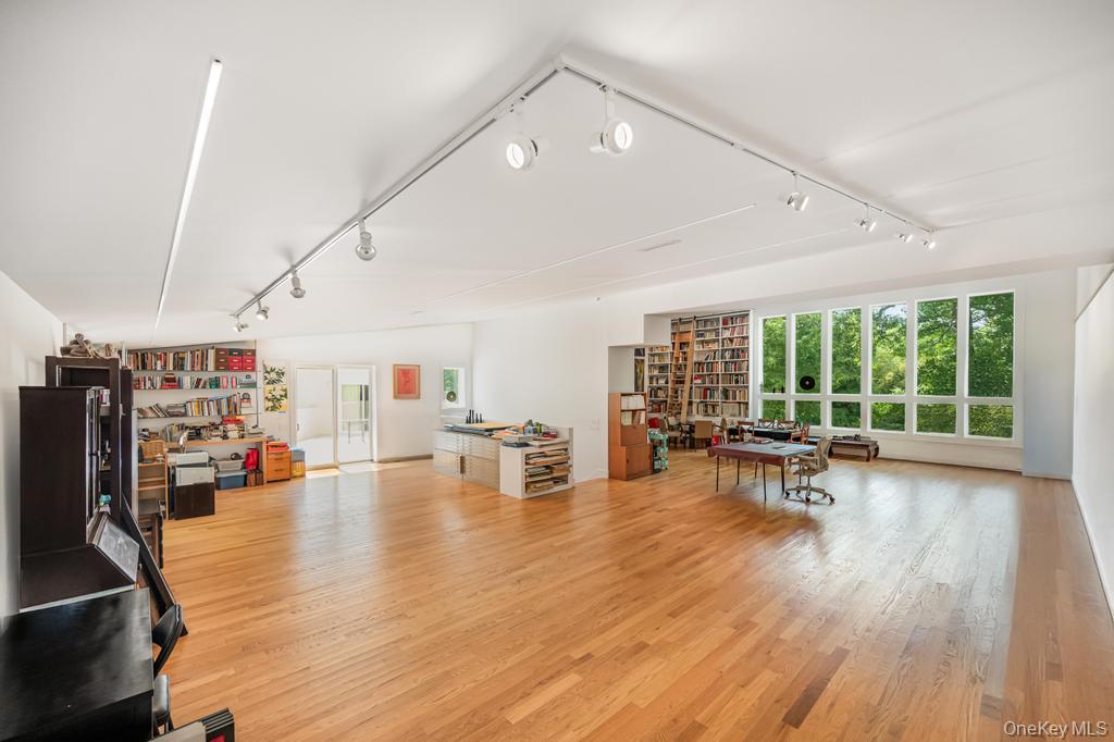 2222 Noyack Road Sag Harbor, NY 11963 - Photo 23 of 47 a view of a living room and dining room