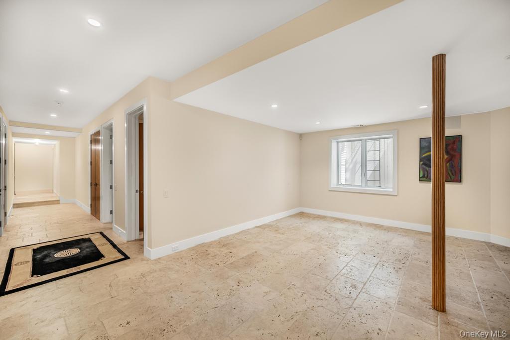 2222 Noyack Road Sag Harbor, NY 11963 - Photo 37 of 47 a view of an empty room with a window